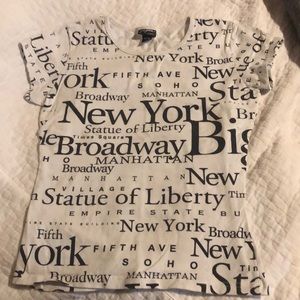 New York T-Shirt says  XL but looks more like Med.